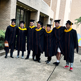 Students in graduation regalia