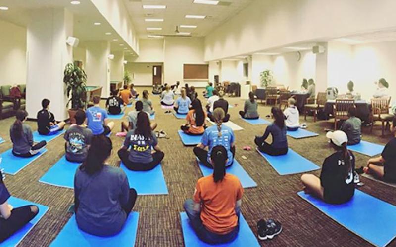 Students doing yoga